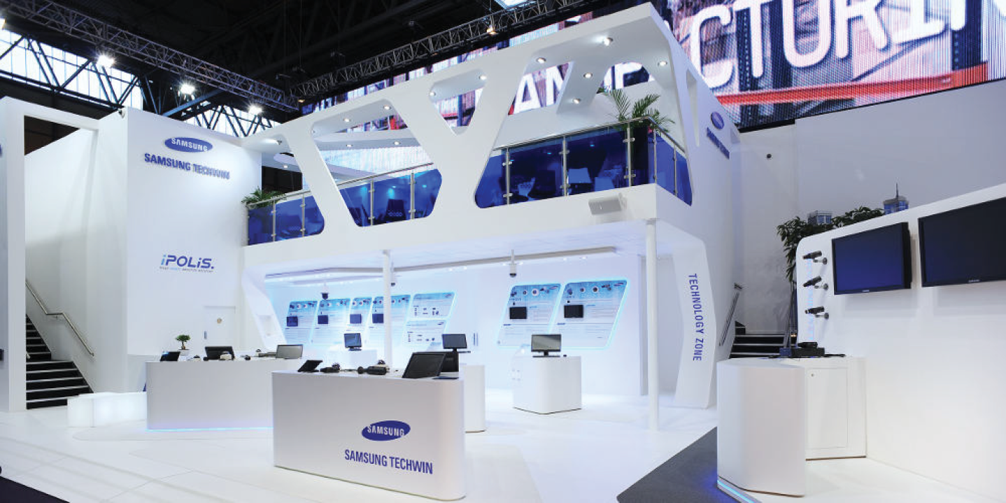 Futuristic Samsung Techwin booth interior with technology demonstration area